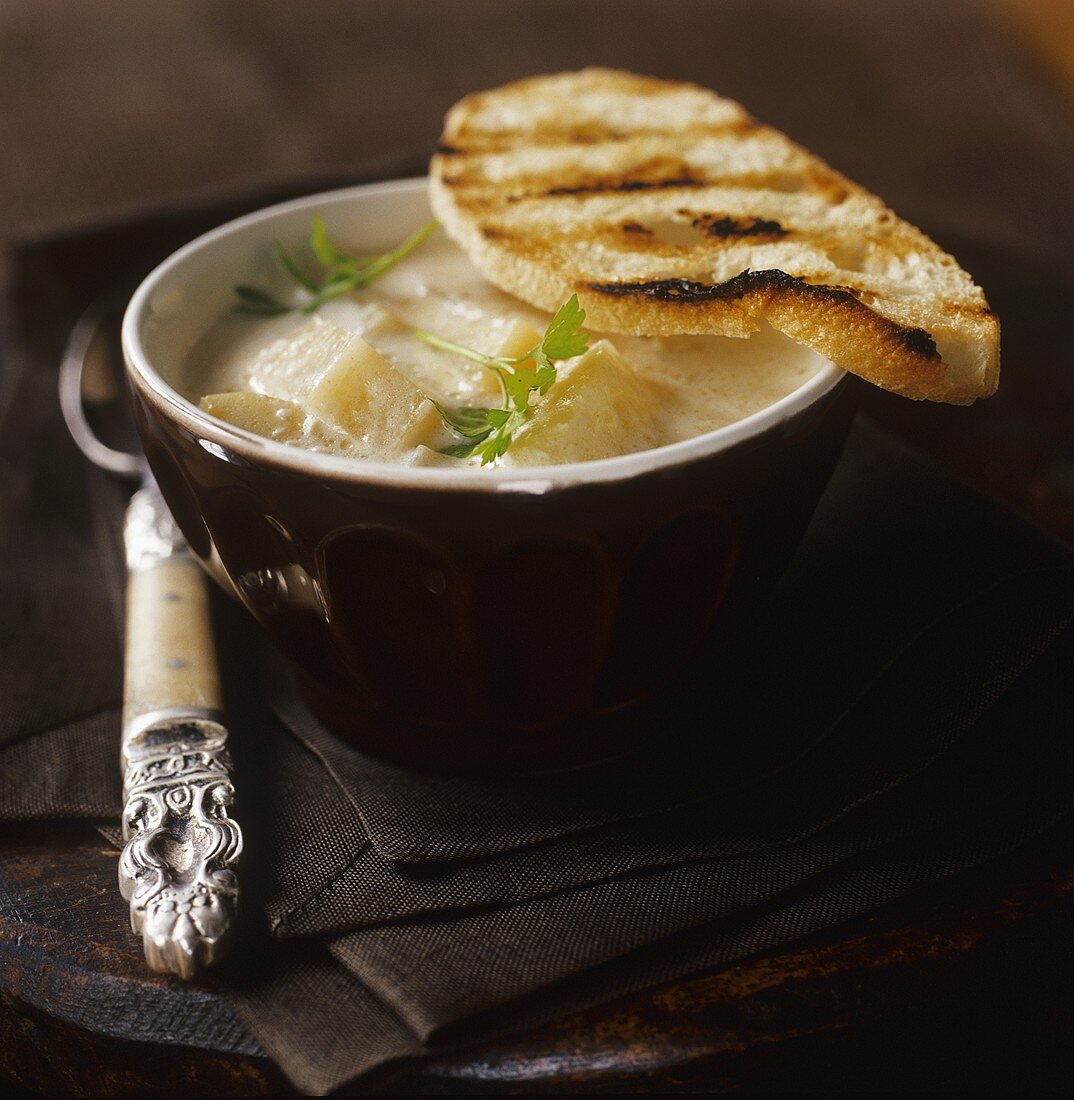 Pineapple soup with cashew nuts