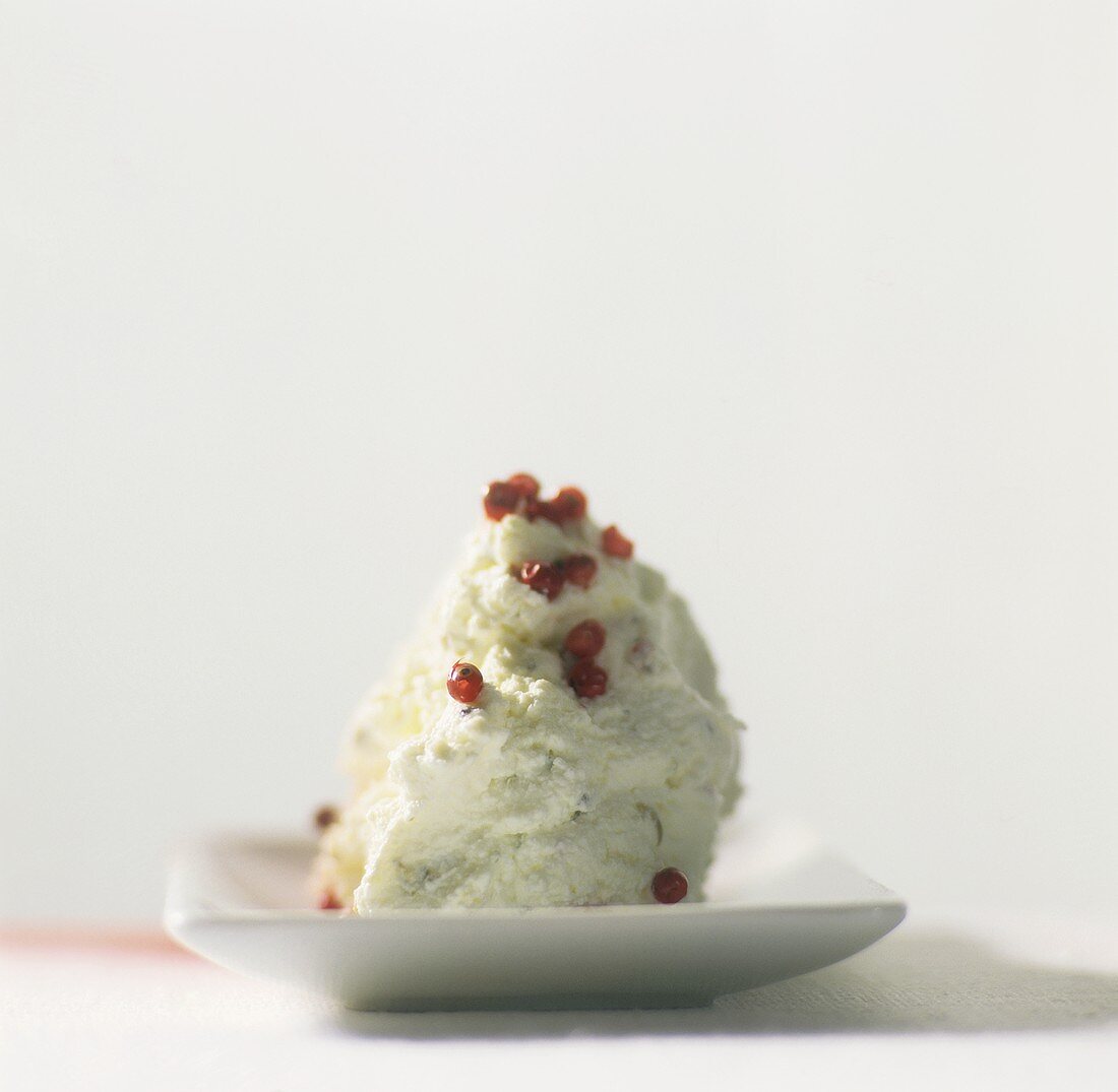 Soft cheese with pink peppercorns
