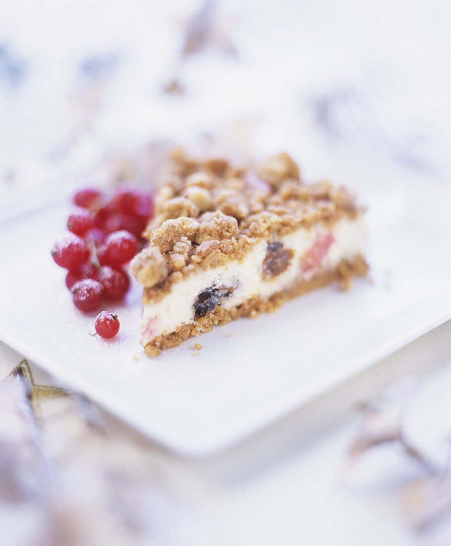 Mincemeat cheesecake garnished with redcurrants