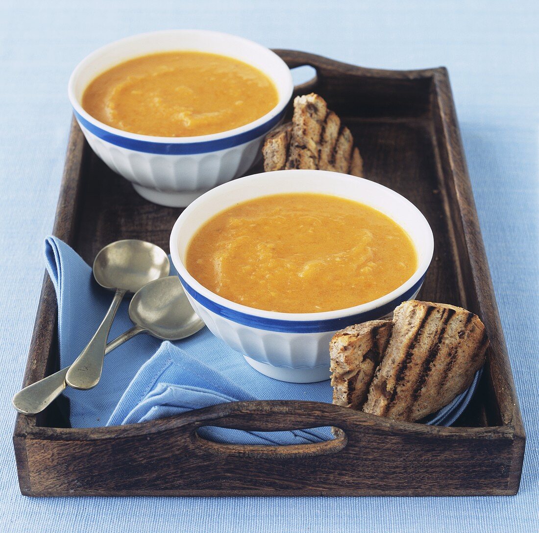 Cream of pumpkin soup with grilled bread