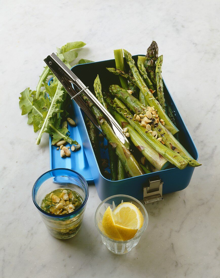 Grilled green asparagus with nut dressing