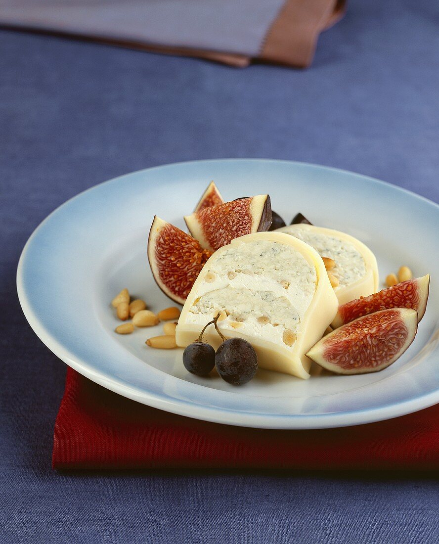 Cheese terrine with pine nuts and figs