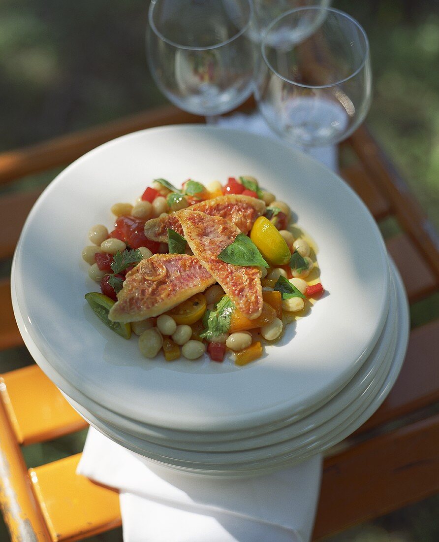 Red mullet with white beans and peppers