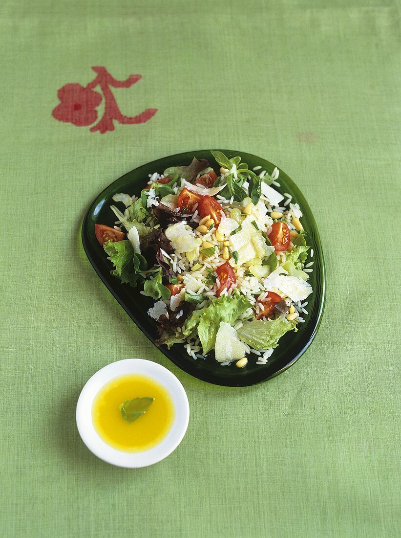 Rice salad with vegetables and pine nuts