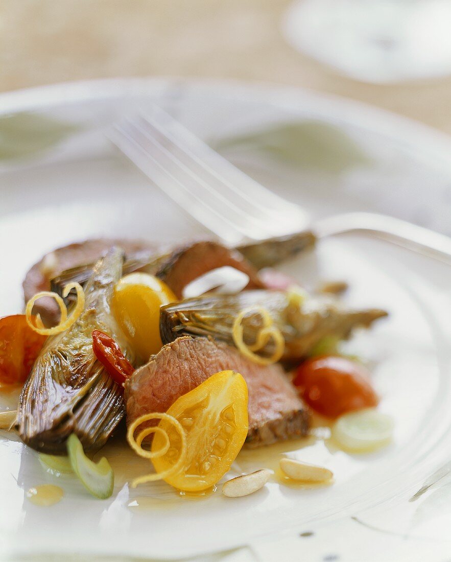 Boneless loin of lamb with roasted artichokes