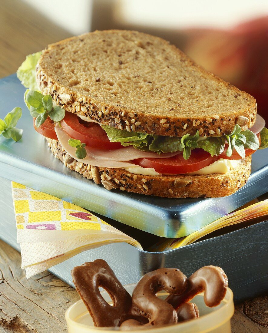 Ham, lettuce, tomato and cress sandwich (multi-grain bread)