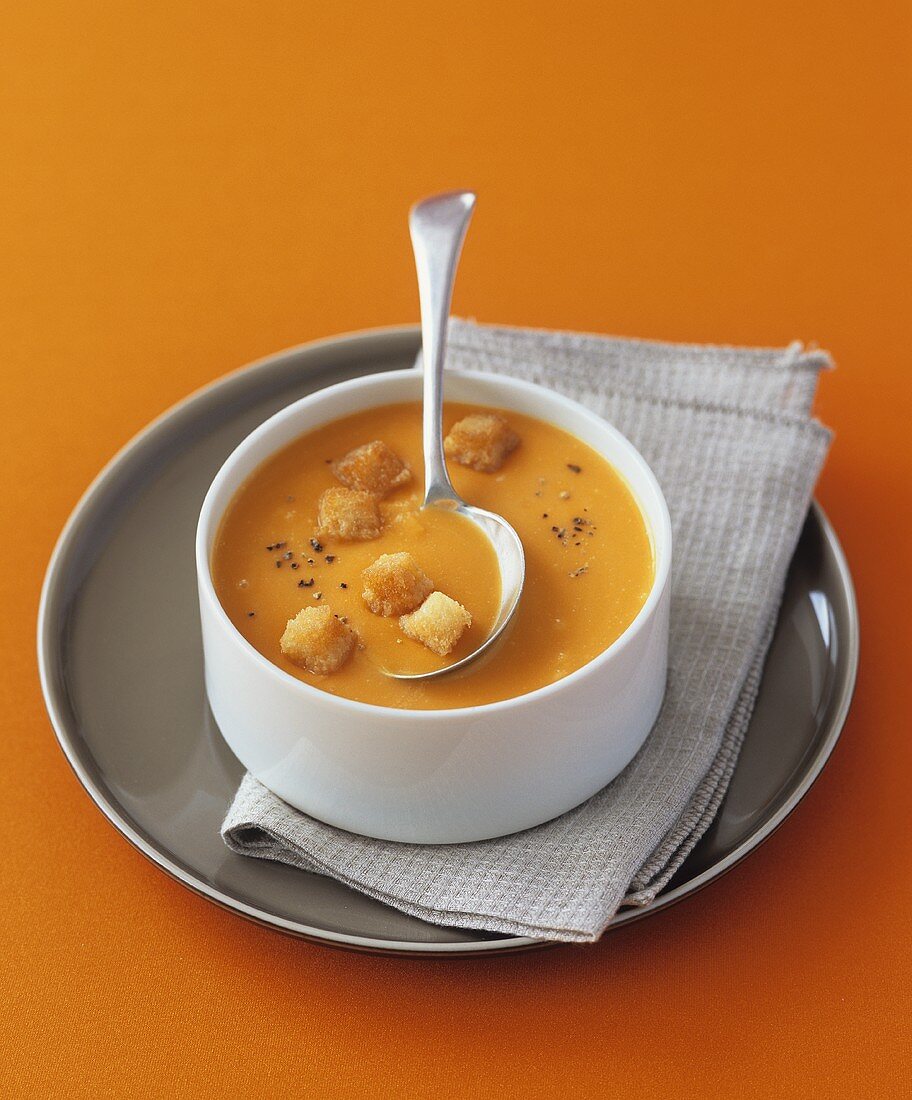 Cream of carrot soup with croutons