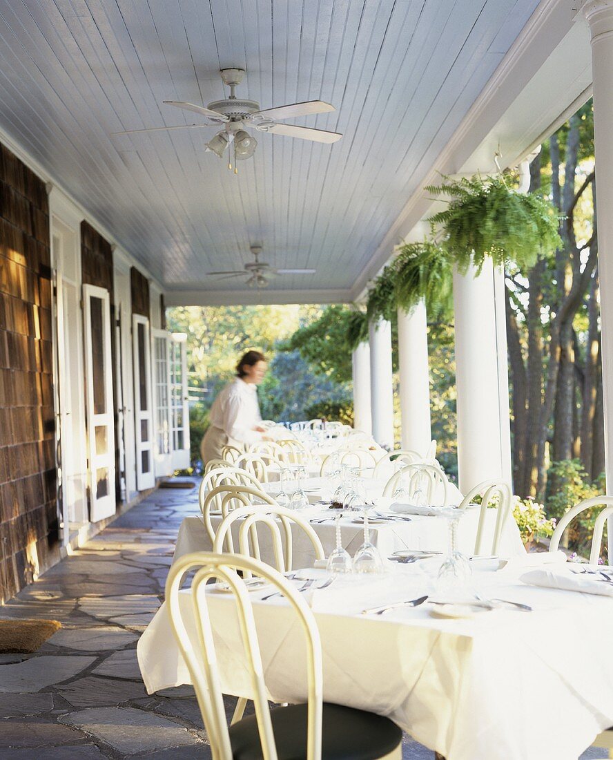 Laid tables on the terrace of a restaurant