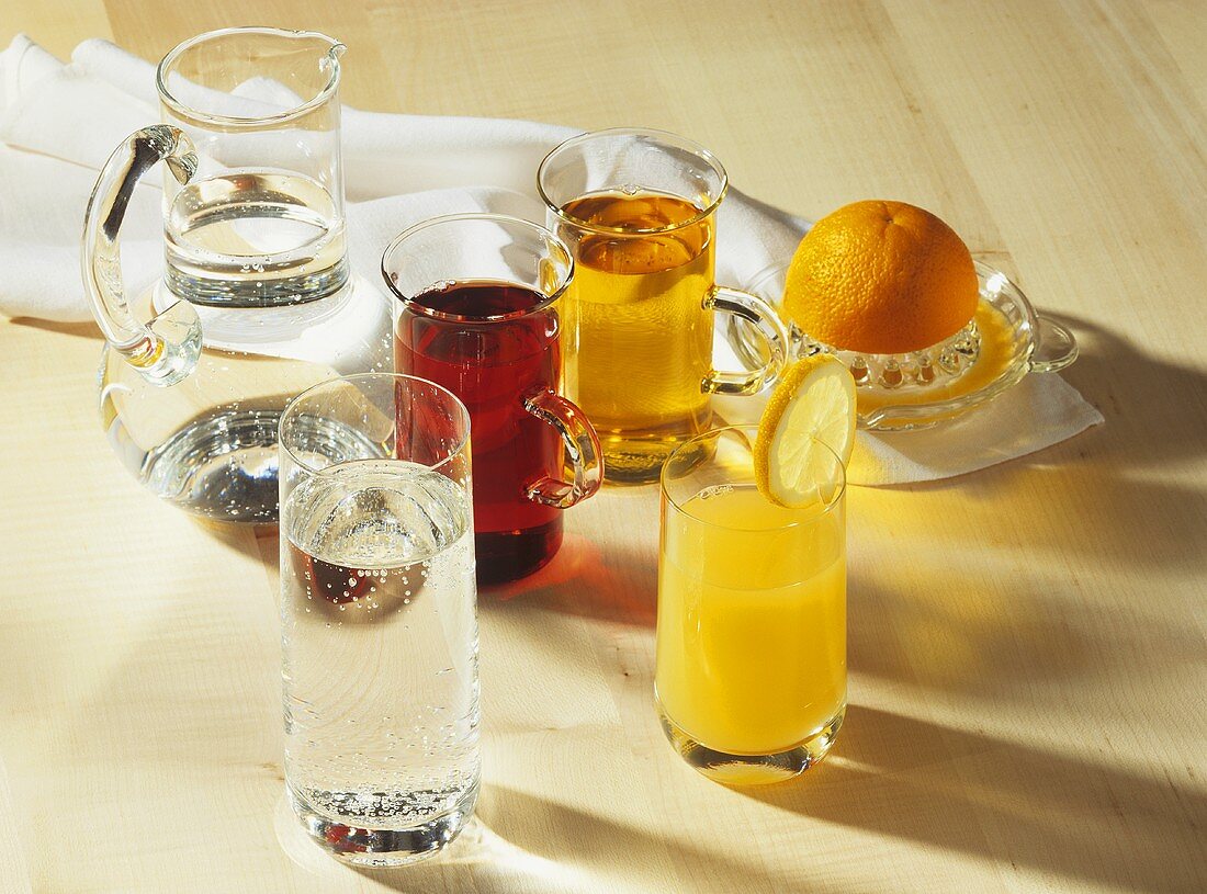 Orange juice, mineral water, grape juice and apple juice