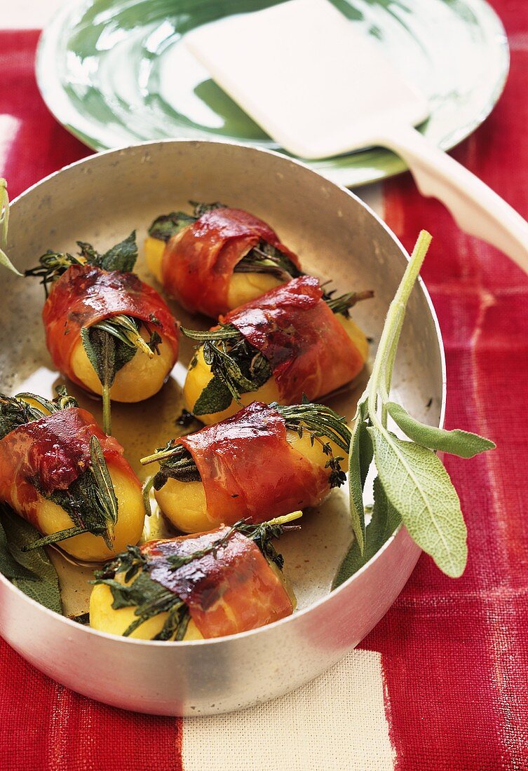 Ham-wrapped potatoes with herbs