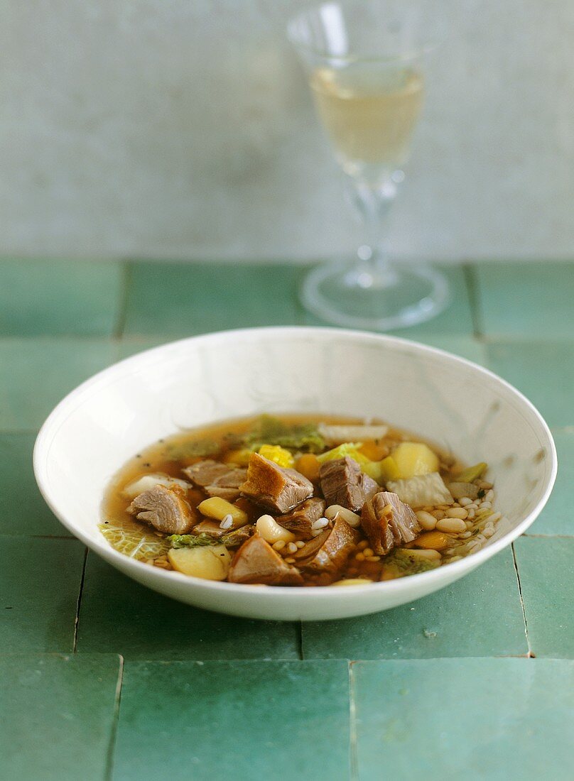 Barley stew with confit of goose