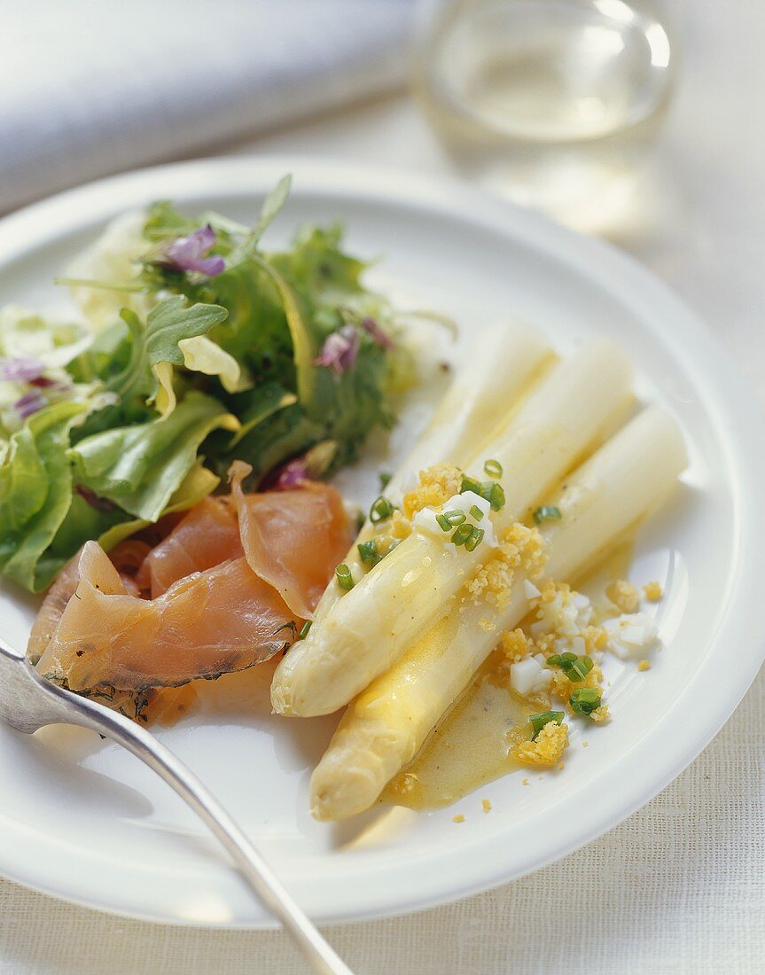 White asparagus with marinated charr and egg dressing