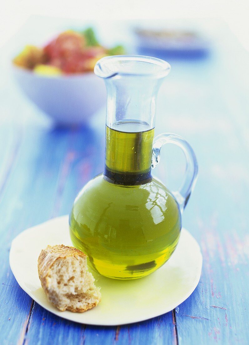 Olive oil and a piece of bread
