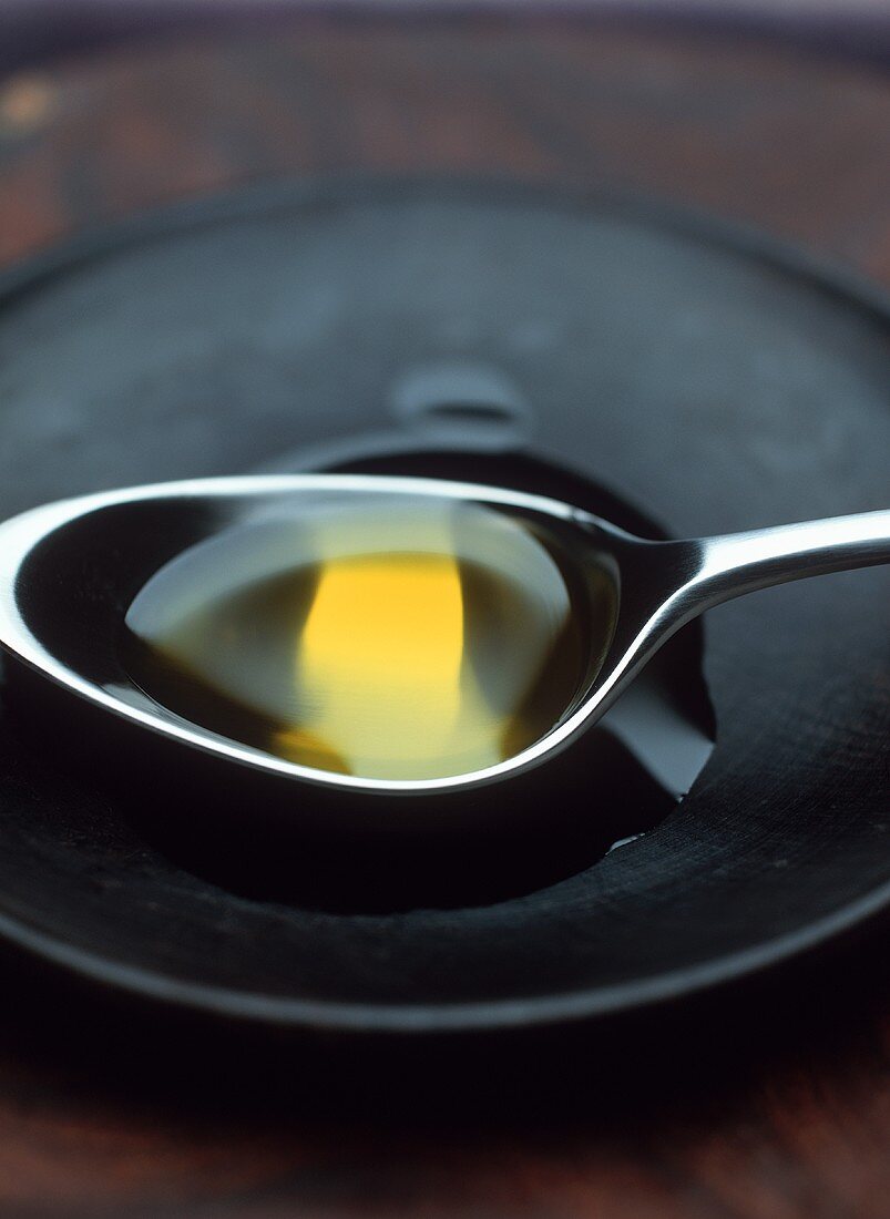 Olive oil in spoon
