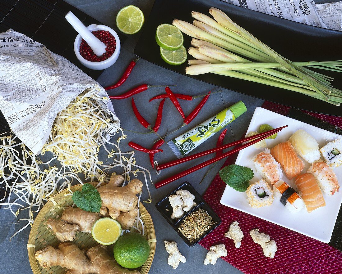 A plate of sushi and various ingredients from the Japanese kitchen