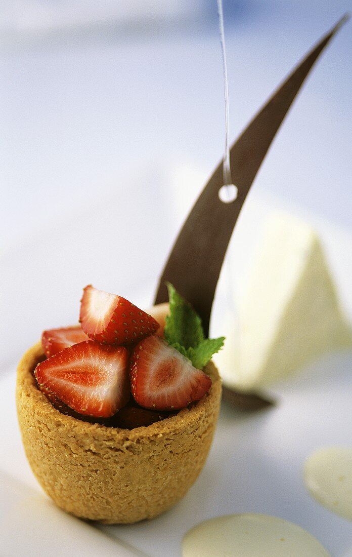 Shortbread cup with yogurt parfait, Champagne sabayon and strawberries