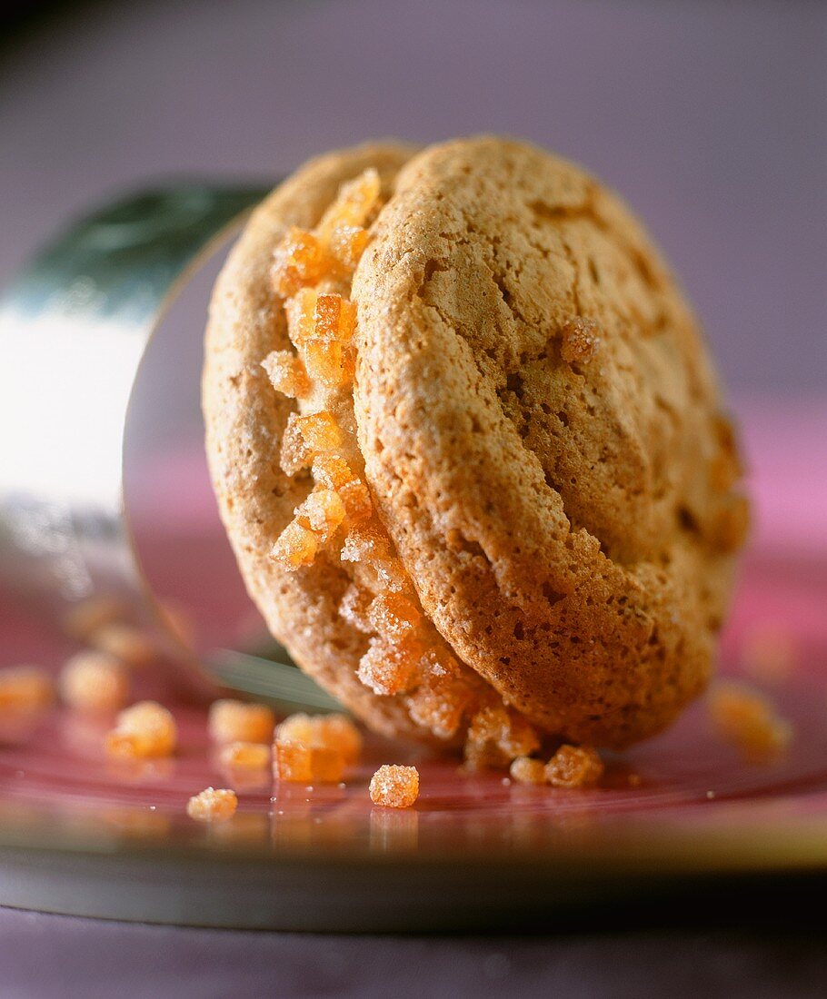 Nut biscuits with coffee cream and candided orange slices