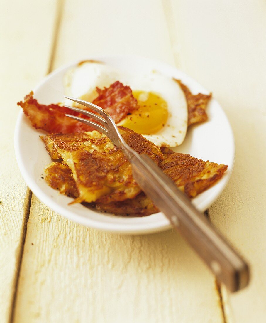 Potato omelette with bacon and egg