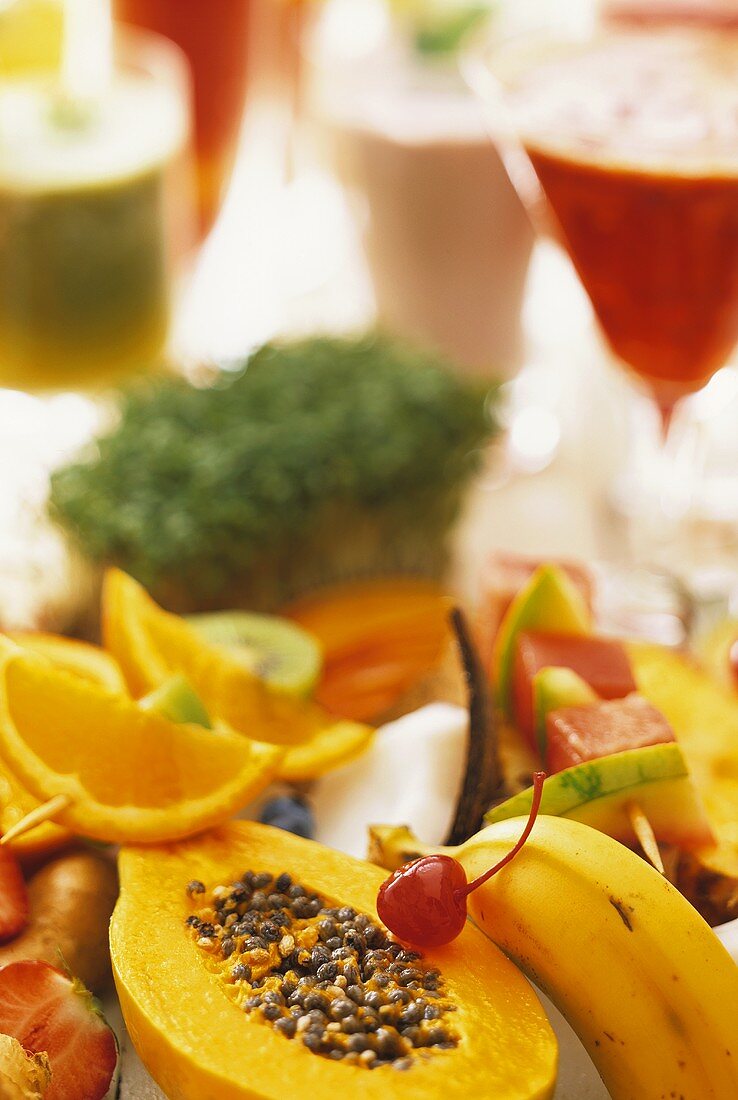 A display of various fruits and fitness drinks