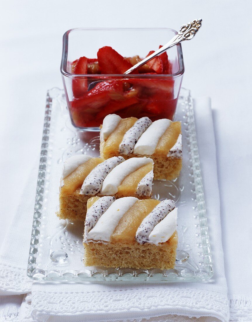 Iced sponge slices with strawberry and rhubarb compoté