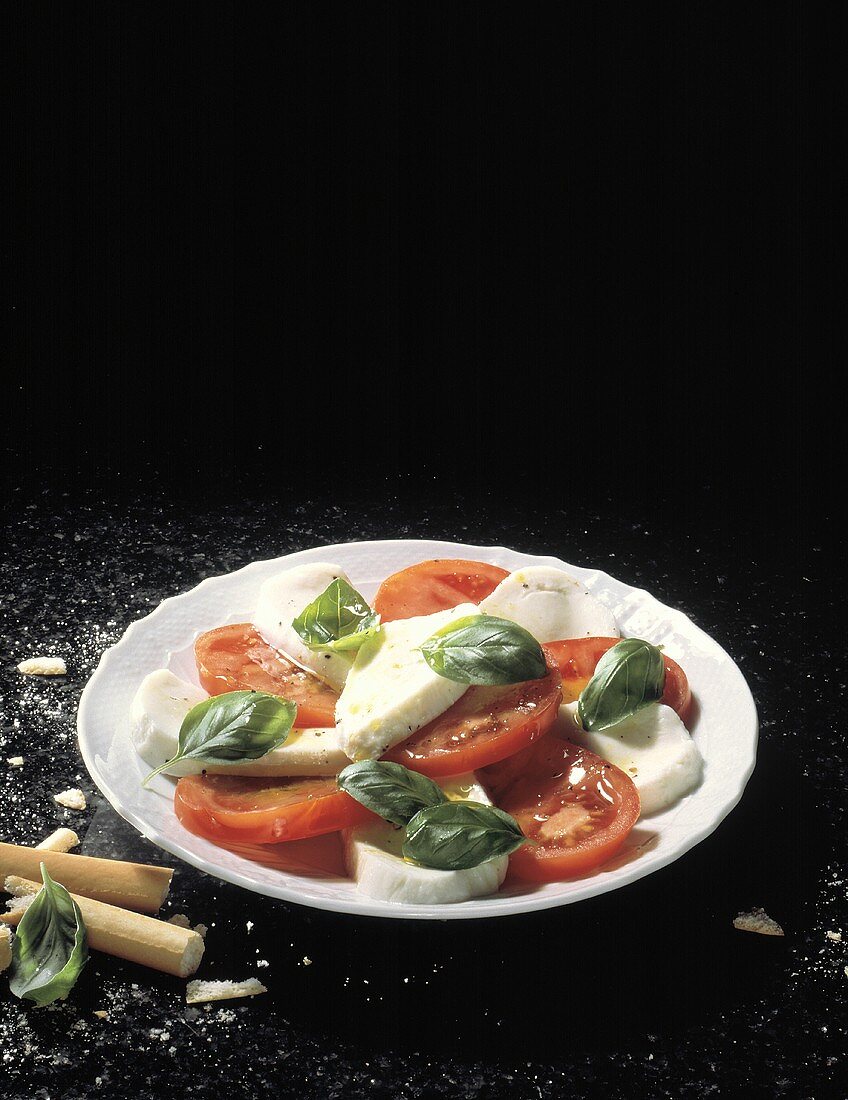 Fresh Tomato Slices with Mozzarella and Basil