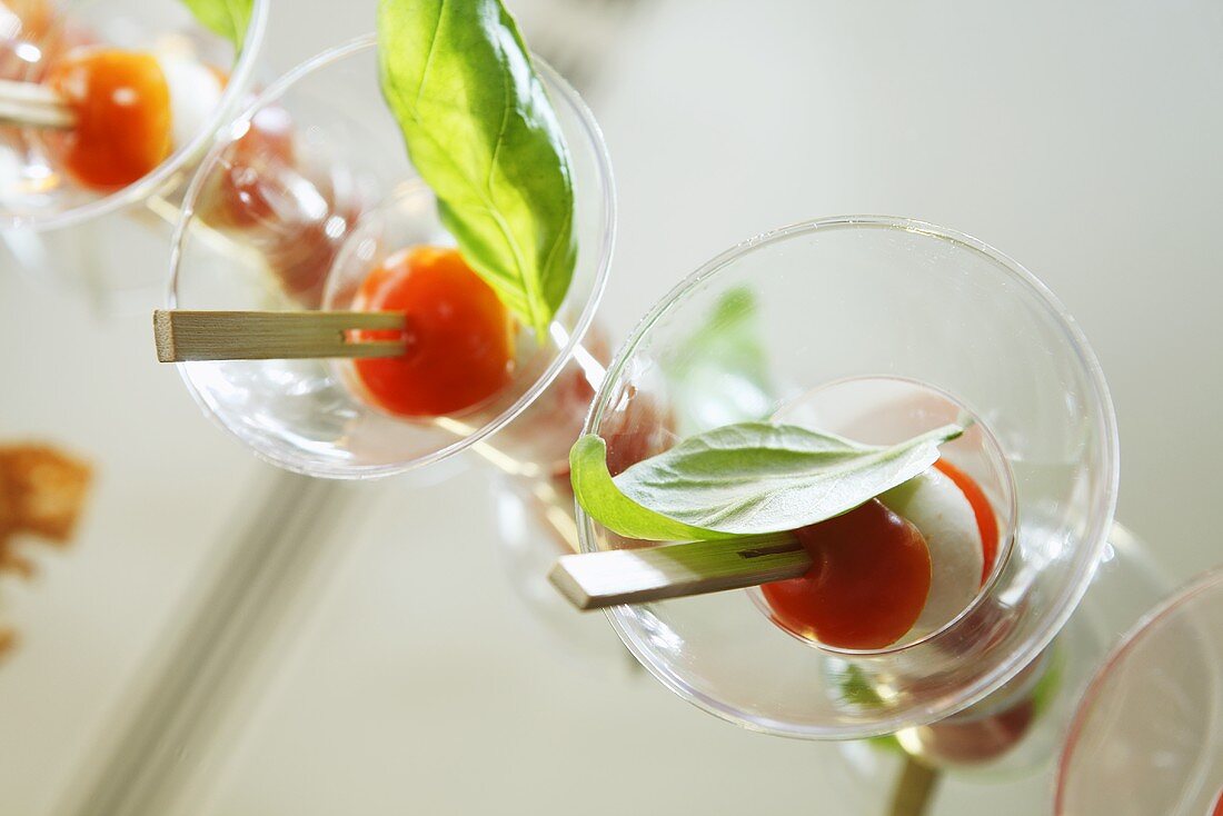 Tomatoes and mozzarella on rosemary skewers