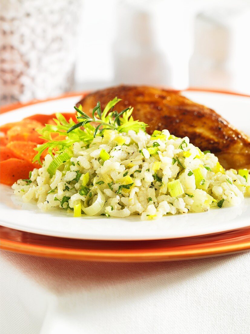 Leek risotto as an accompaniment to chicken breast