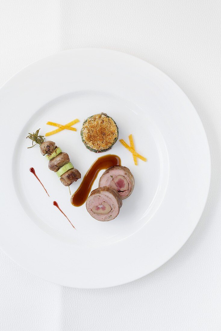 Veal roulade filled with kidneys accompanied by a chard bake