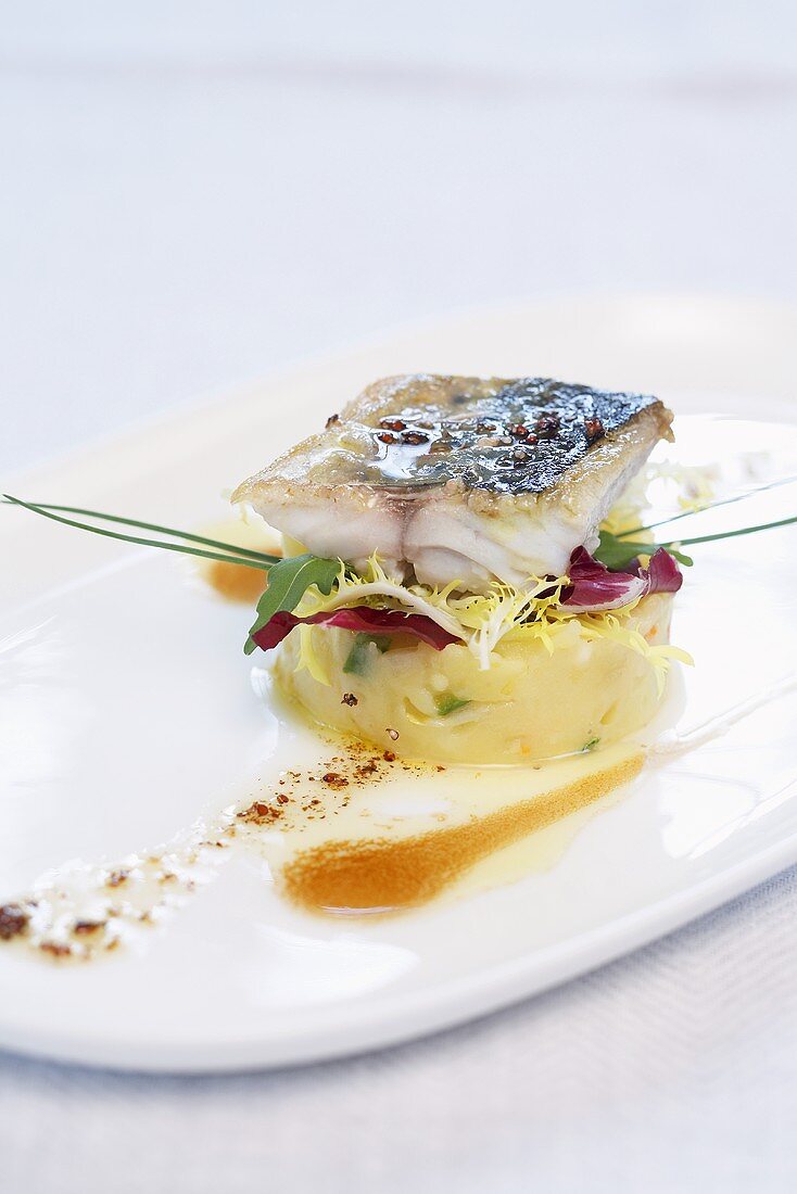 Peppered mackerel on potato salad with grape seed oil