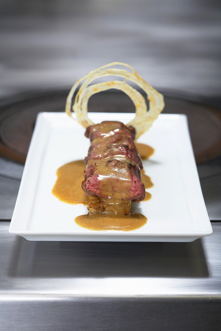 Saddle of venison with dried fruit dumplings