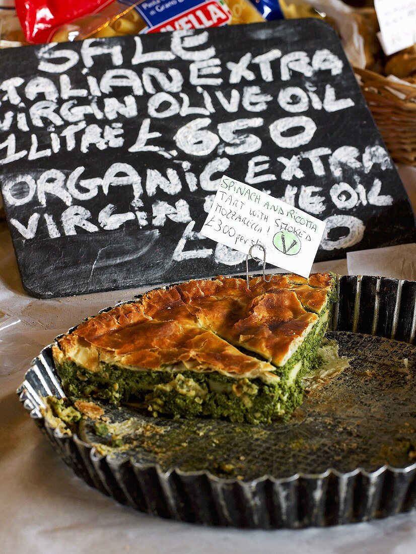 Ricotta spinach pie in baking dish at a Farmer's Market in England