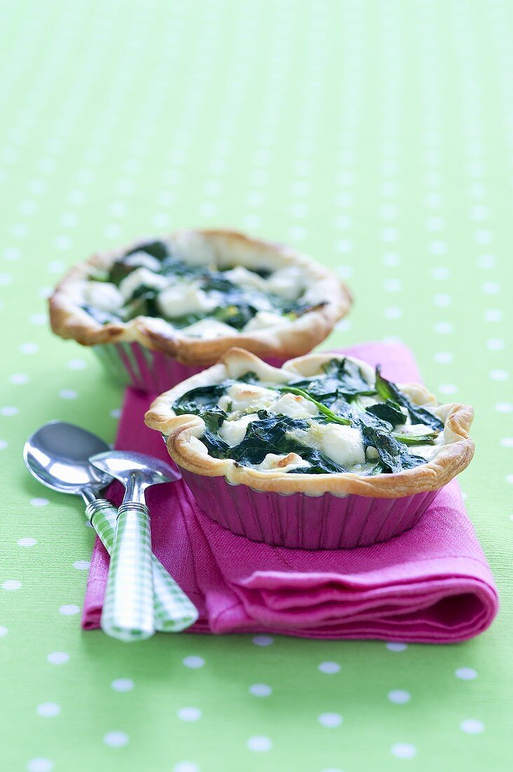 Two spinach tartlets