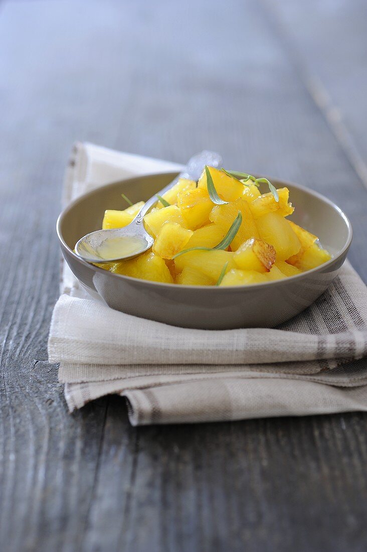 Oven-baked pineapple with tarragon