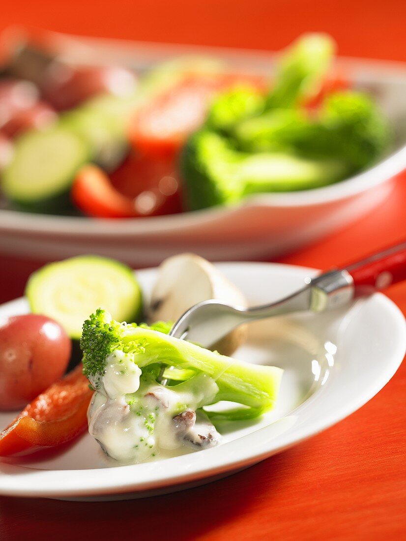 Cheese fondue with vegetables