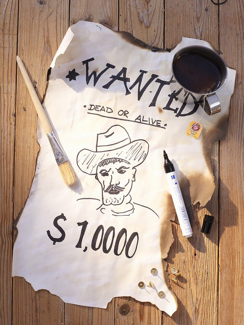 A Western-style 'Wanted' poster for a party