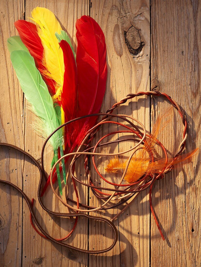 An Indian headdress with feathers and tassels as a prop for a Western-themed party