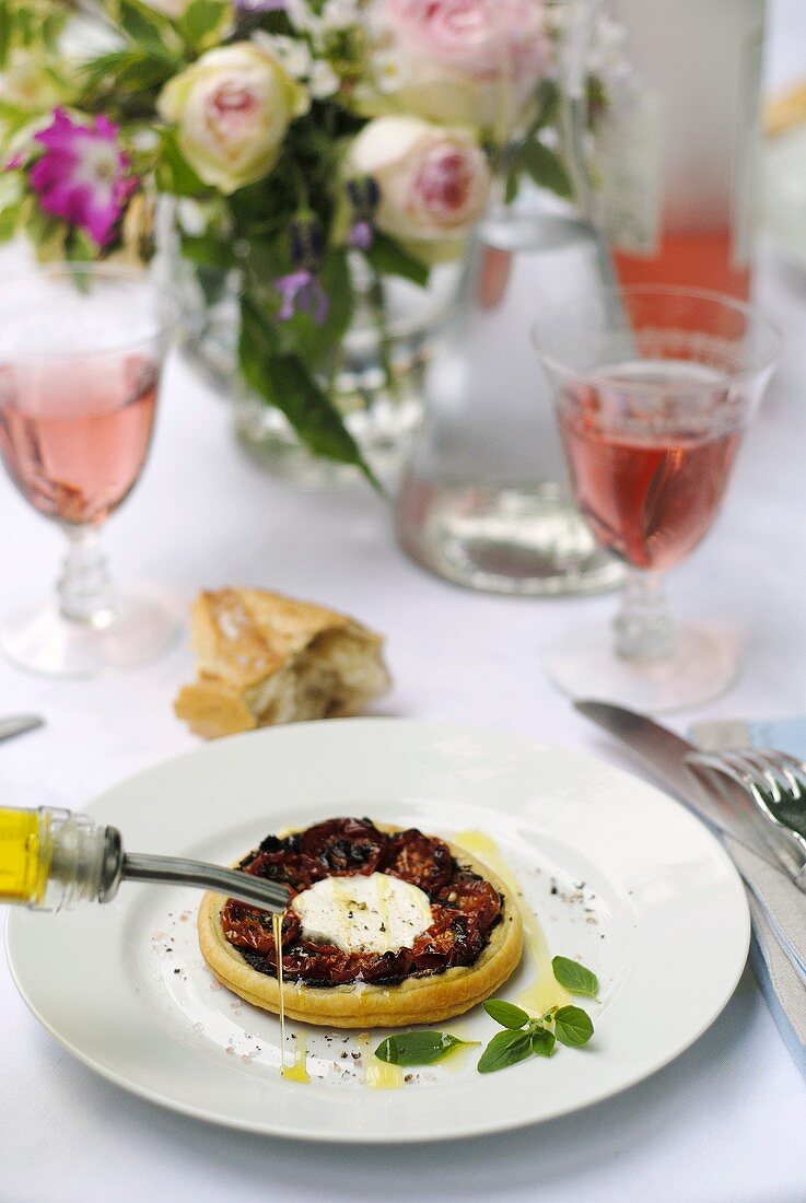 Goats' cheese tartlet with olive oil