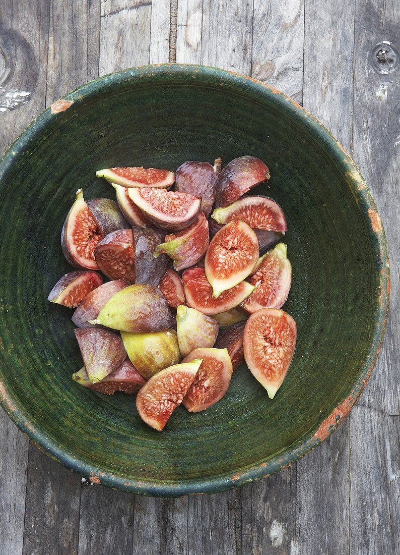 Chopped figs in a ceramic bowl