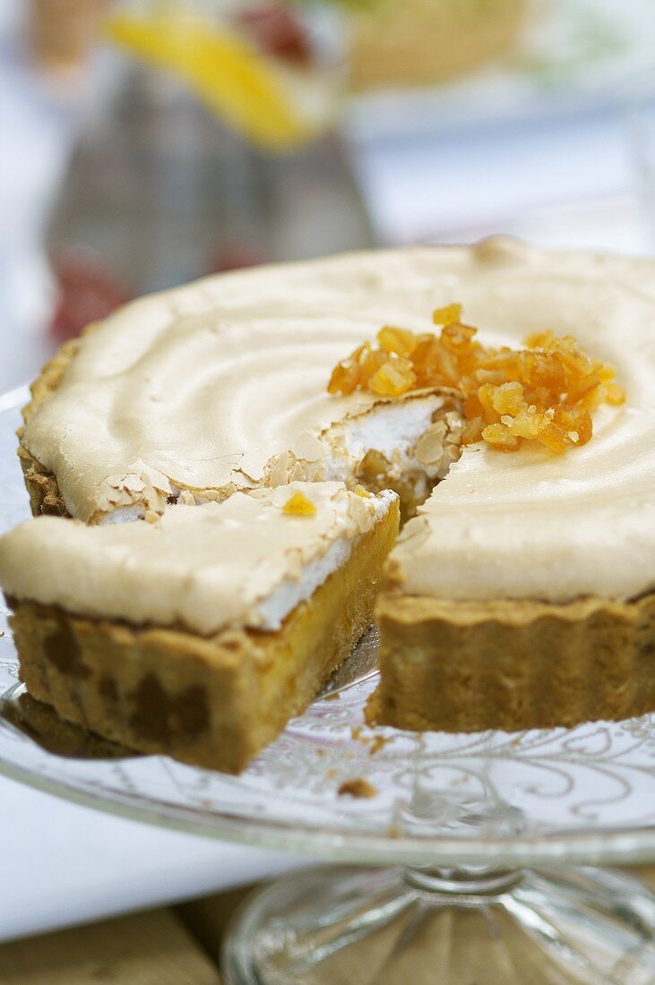 Lemon tart with a meringue topping and candided ginger