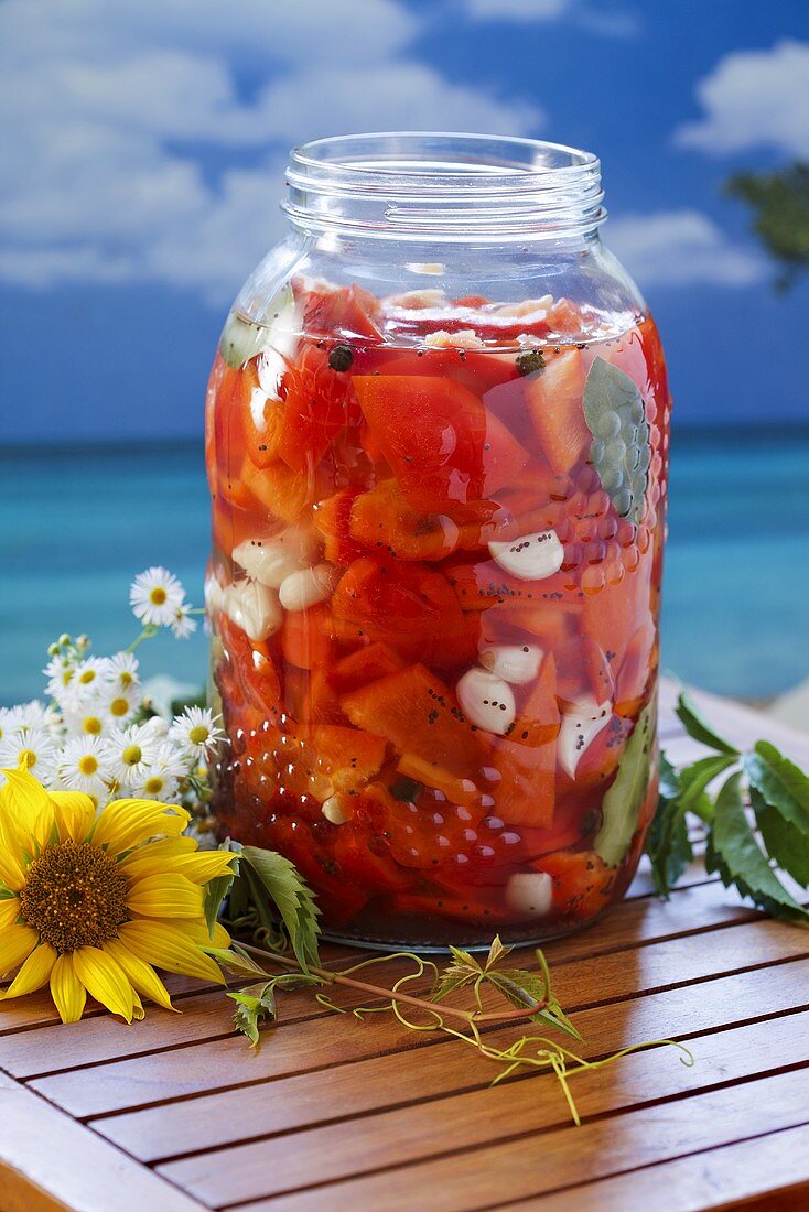A jar of peppers in oil