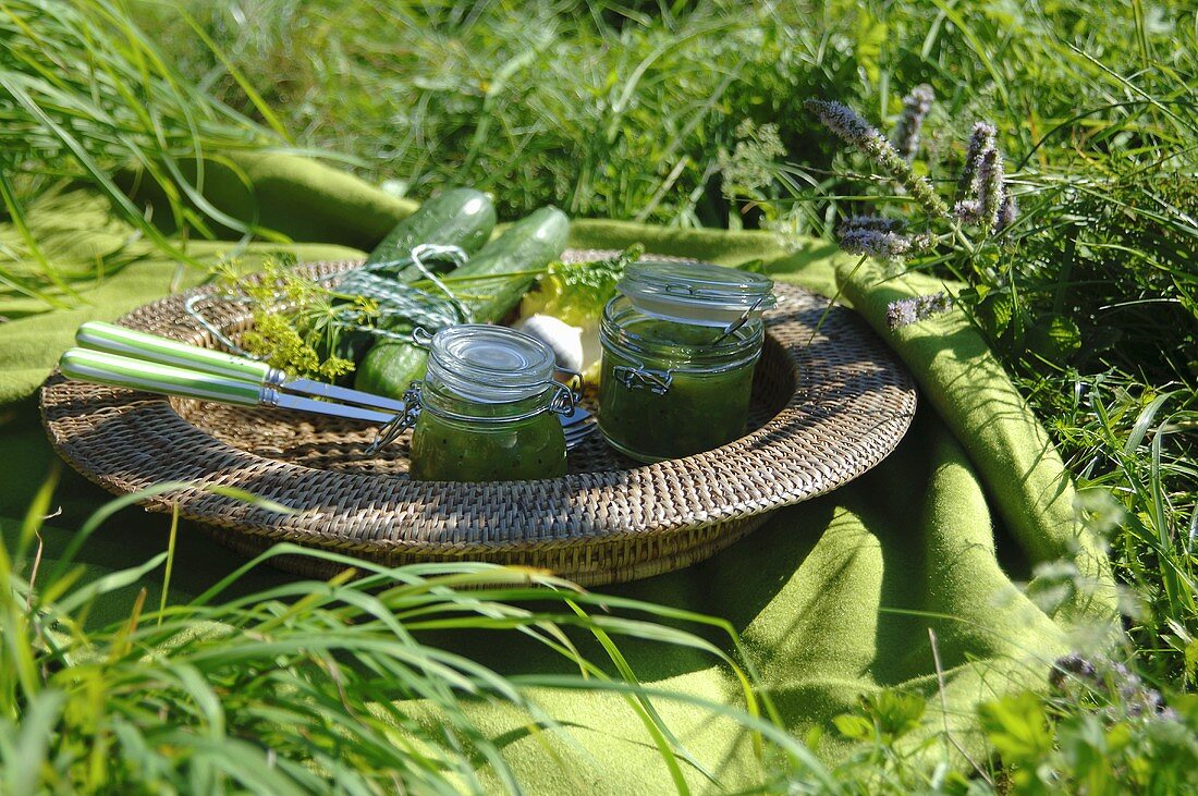 Two jars of gherkin and garlic chutney for a picnic
