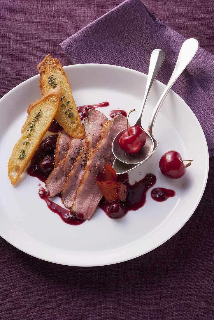 Roasted duck breast in a cherry and port sauce