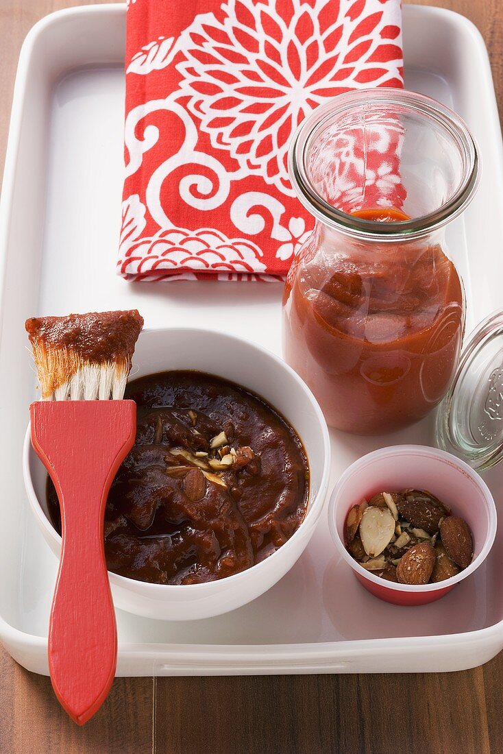 Tomato ketchup and BBQ sauce with smoked almonds