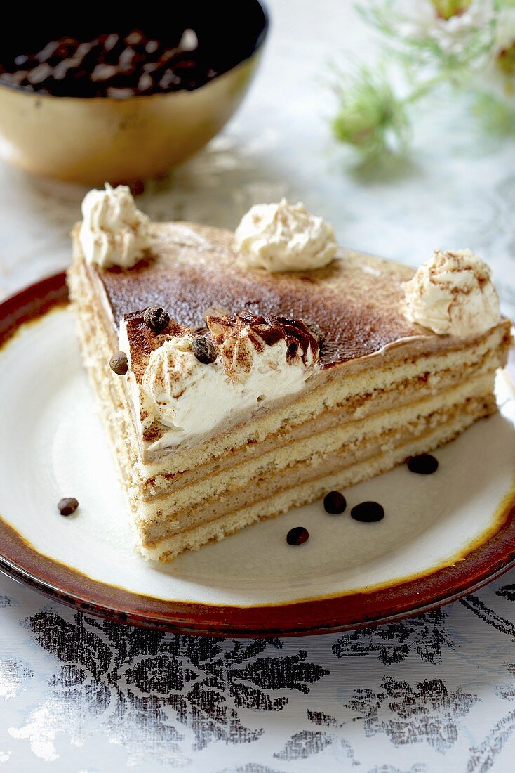 A slice of layered coffee cake
