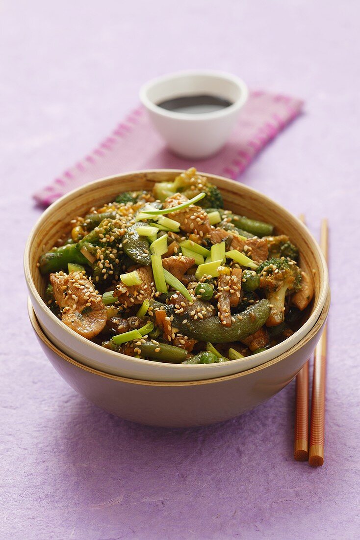 Chicken stir fry with vegetables and sesame