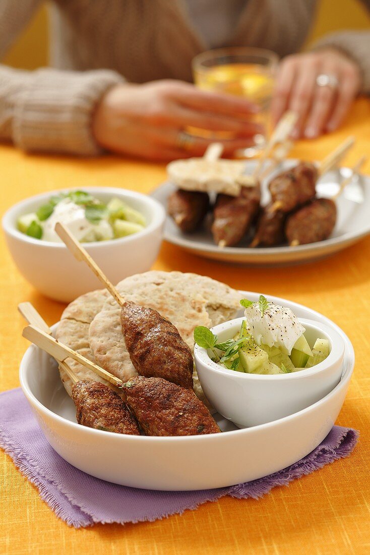 Kofta with pita bread and gherkin salad