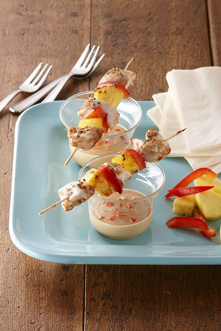 Chicken and pineapple kebabs with peppers and a dip