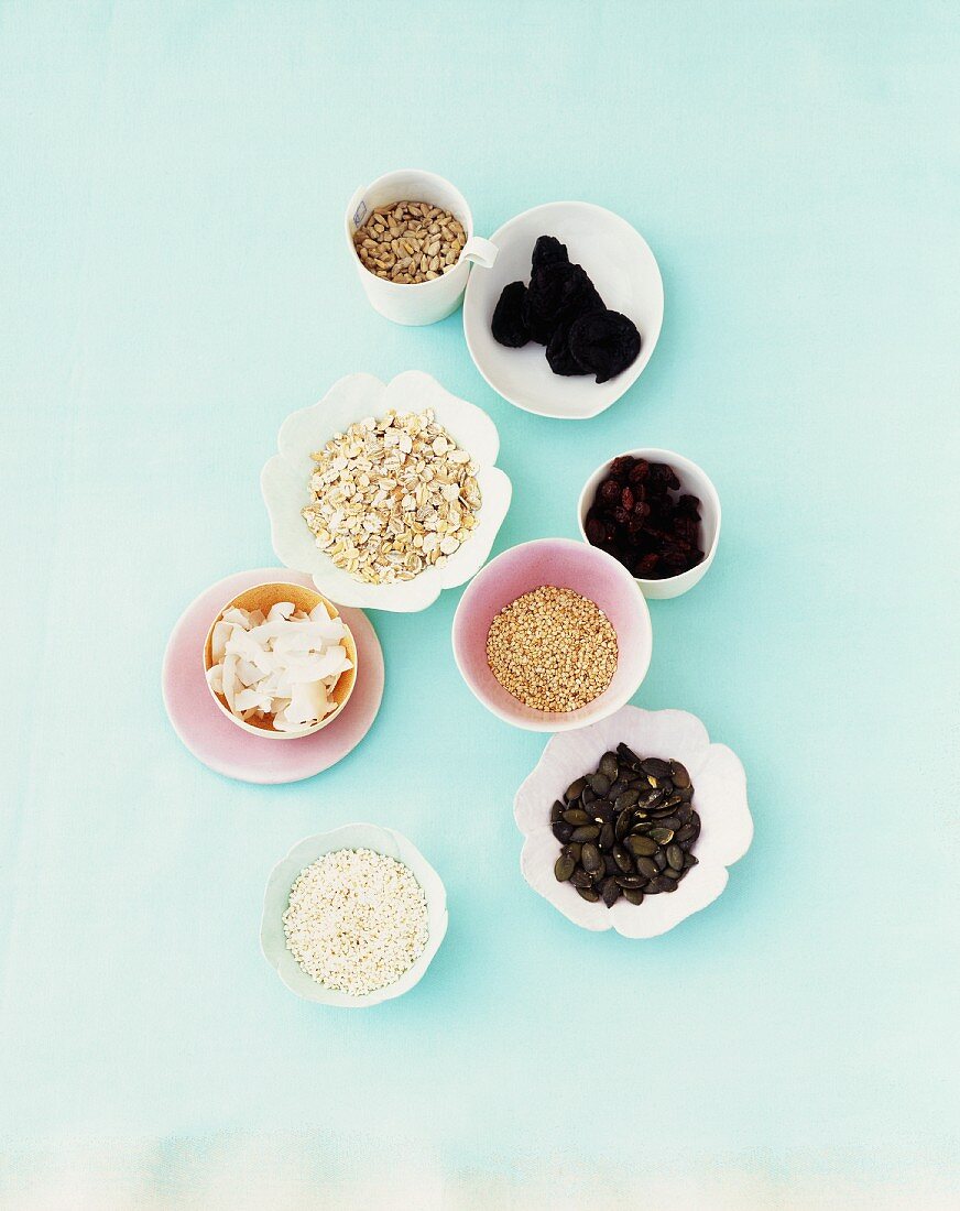 Ingredients from muesli in various bowls