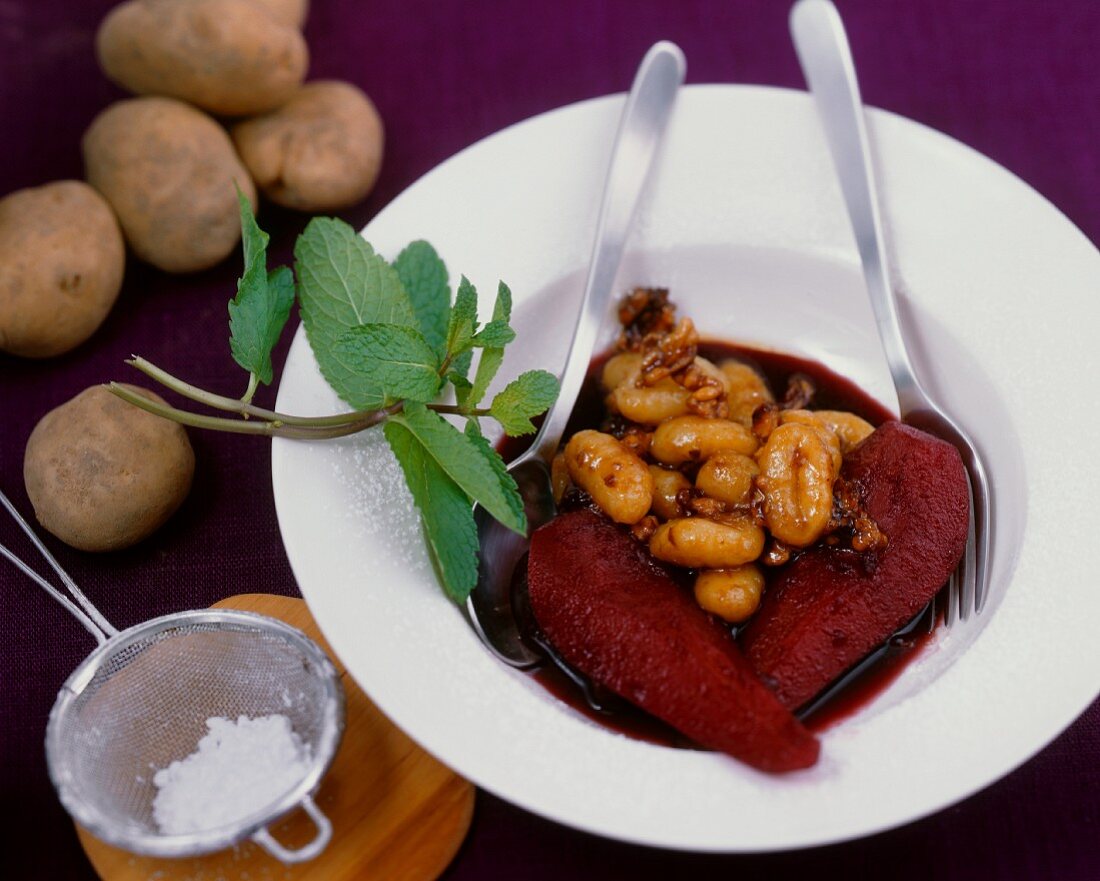 Sweet potato gnocchi with a pear and elderberry compote