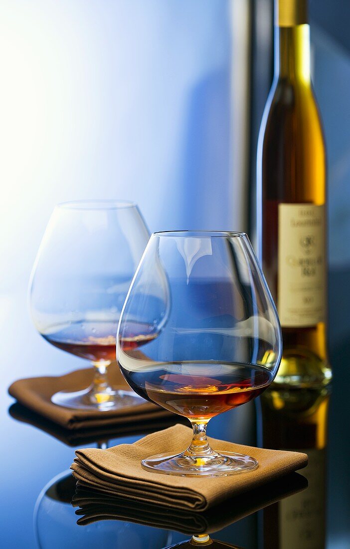 Cognac in glasses and bottle